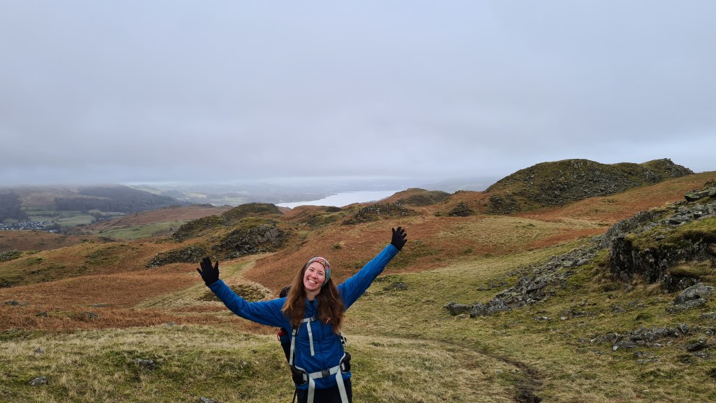Walking up to Loughrigg with Ambleside in background